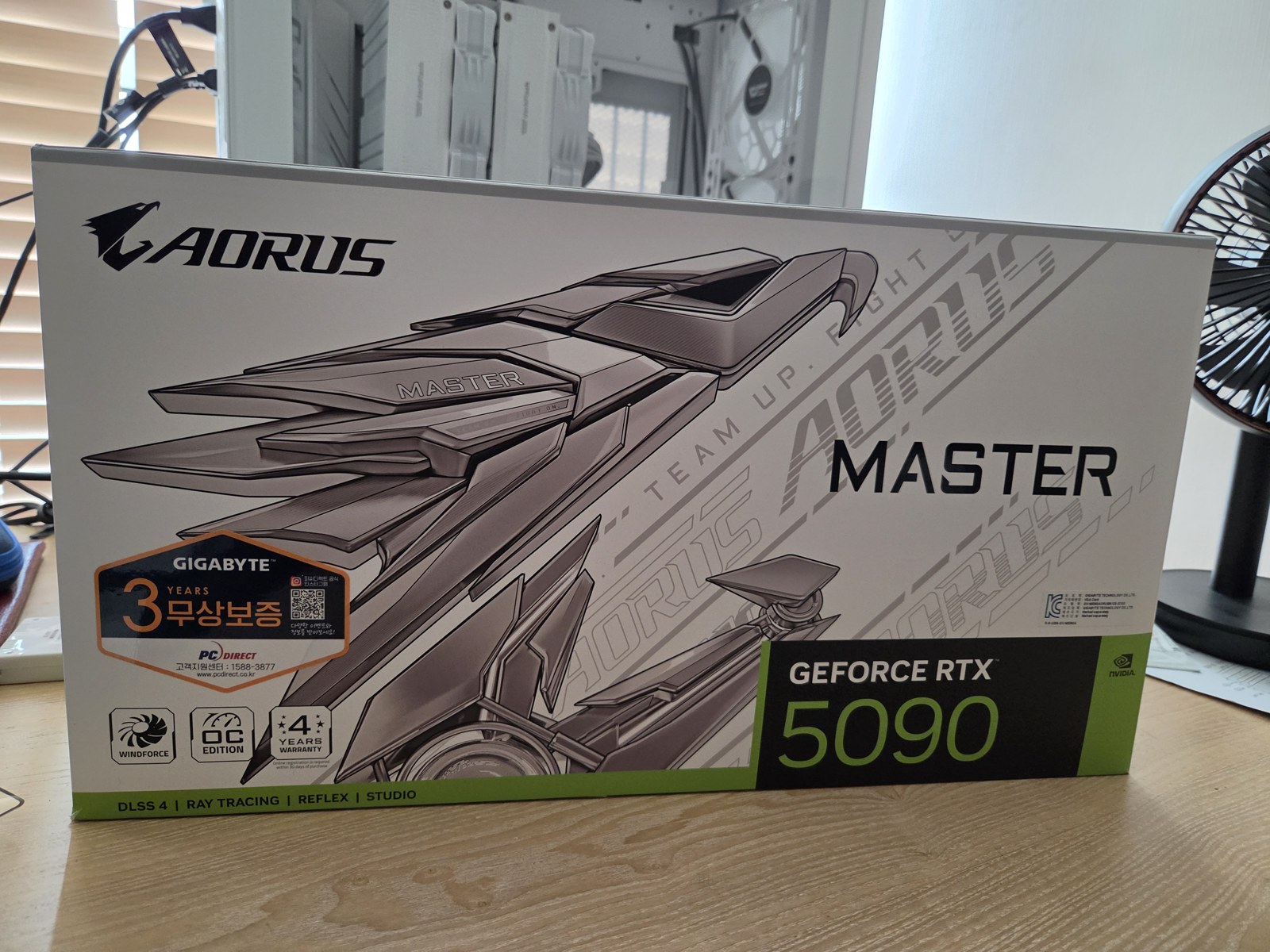Gigabyte RTX 5090 AORUS MASTER box with the PC Direct authenticity sticker